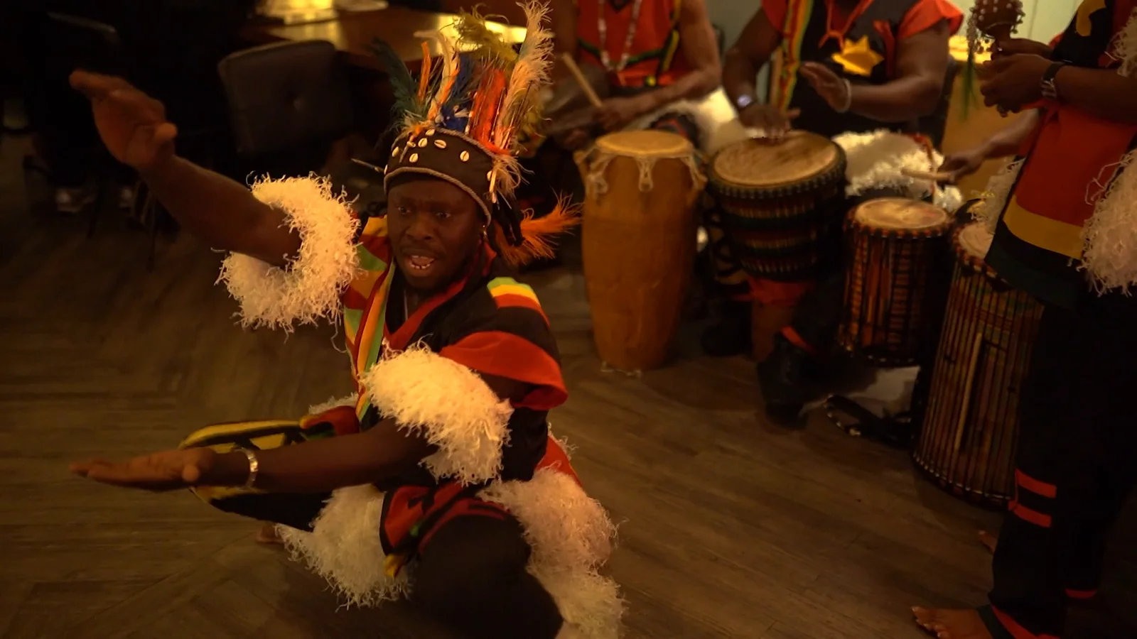 Dancer and live drummers performing at Monika
