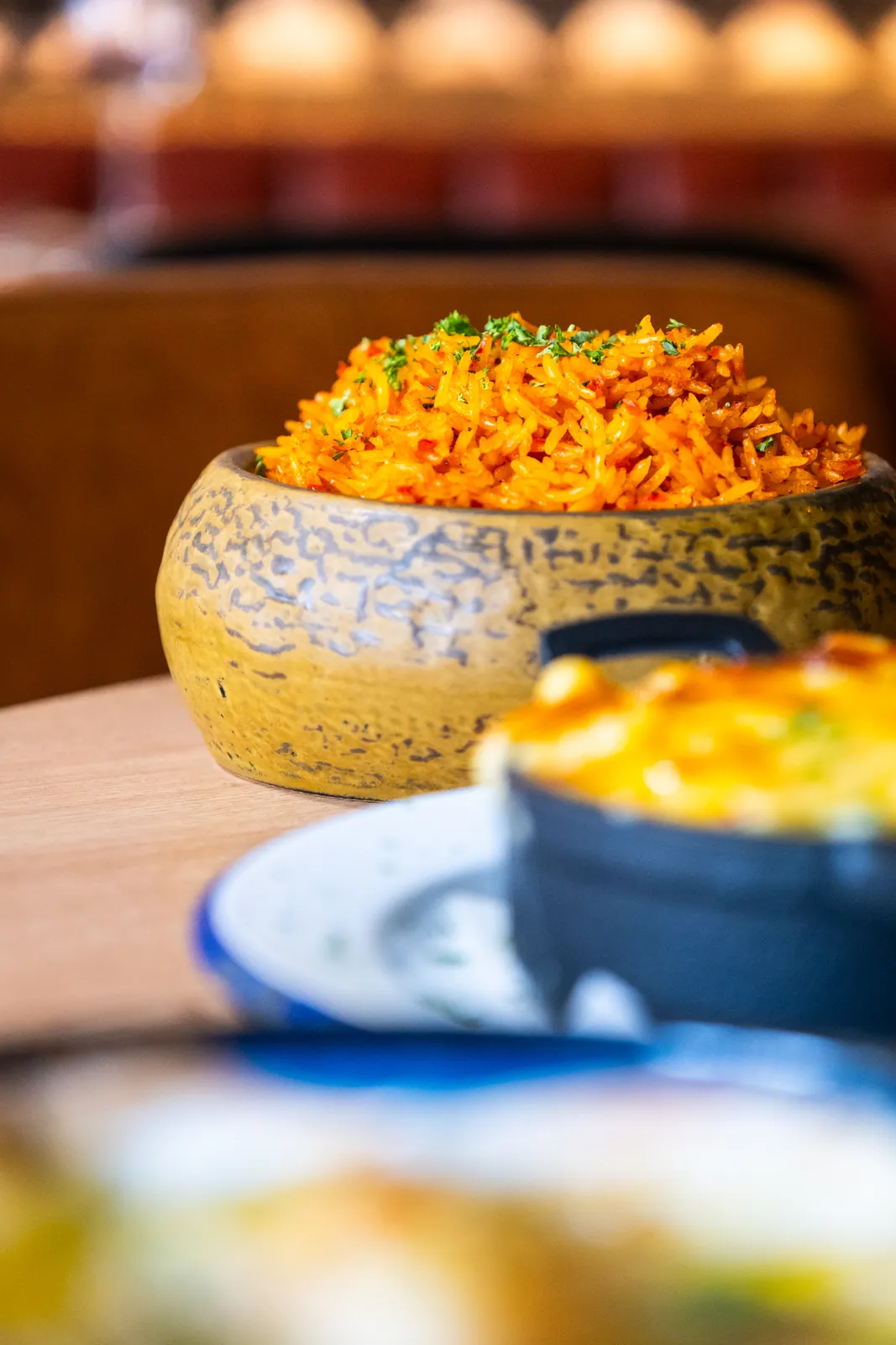 Rice and baked small plates at the table