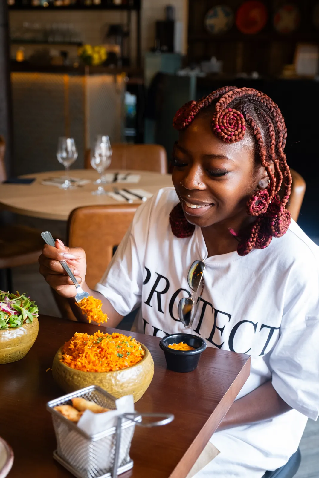 A guest enjoying rice at the table