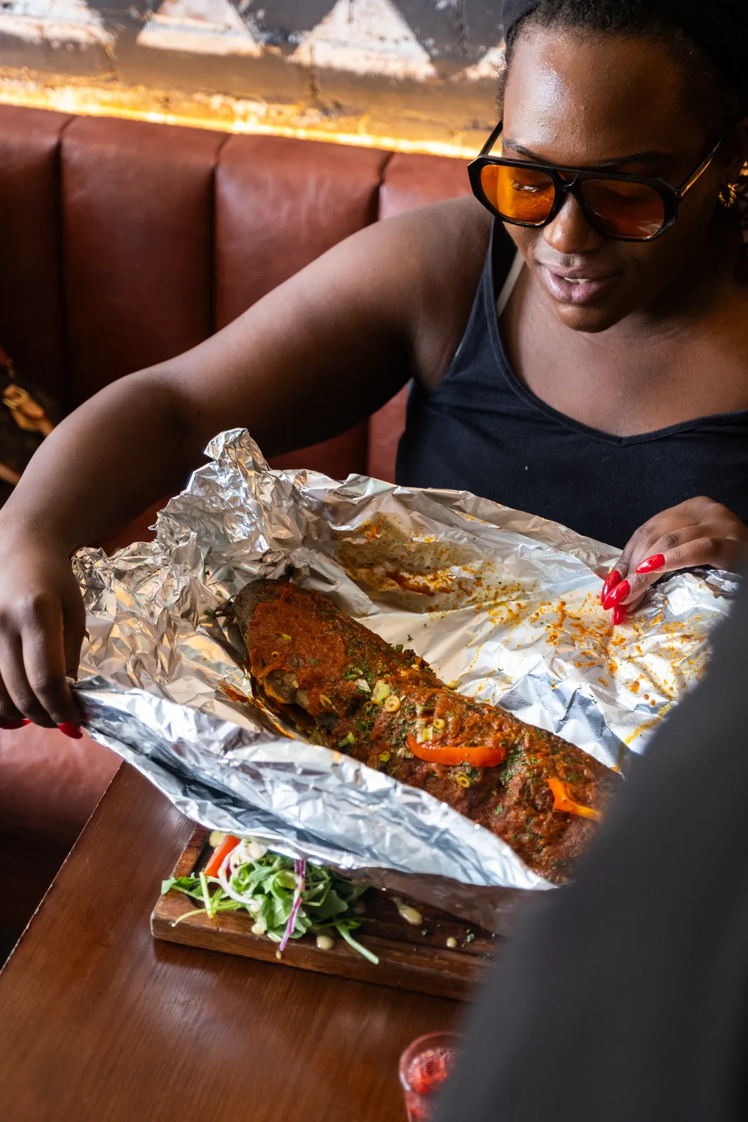 Unwrapping a sharing dish at Monika