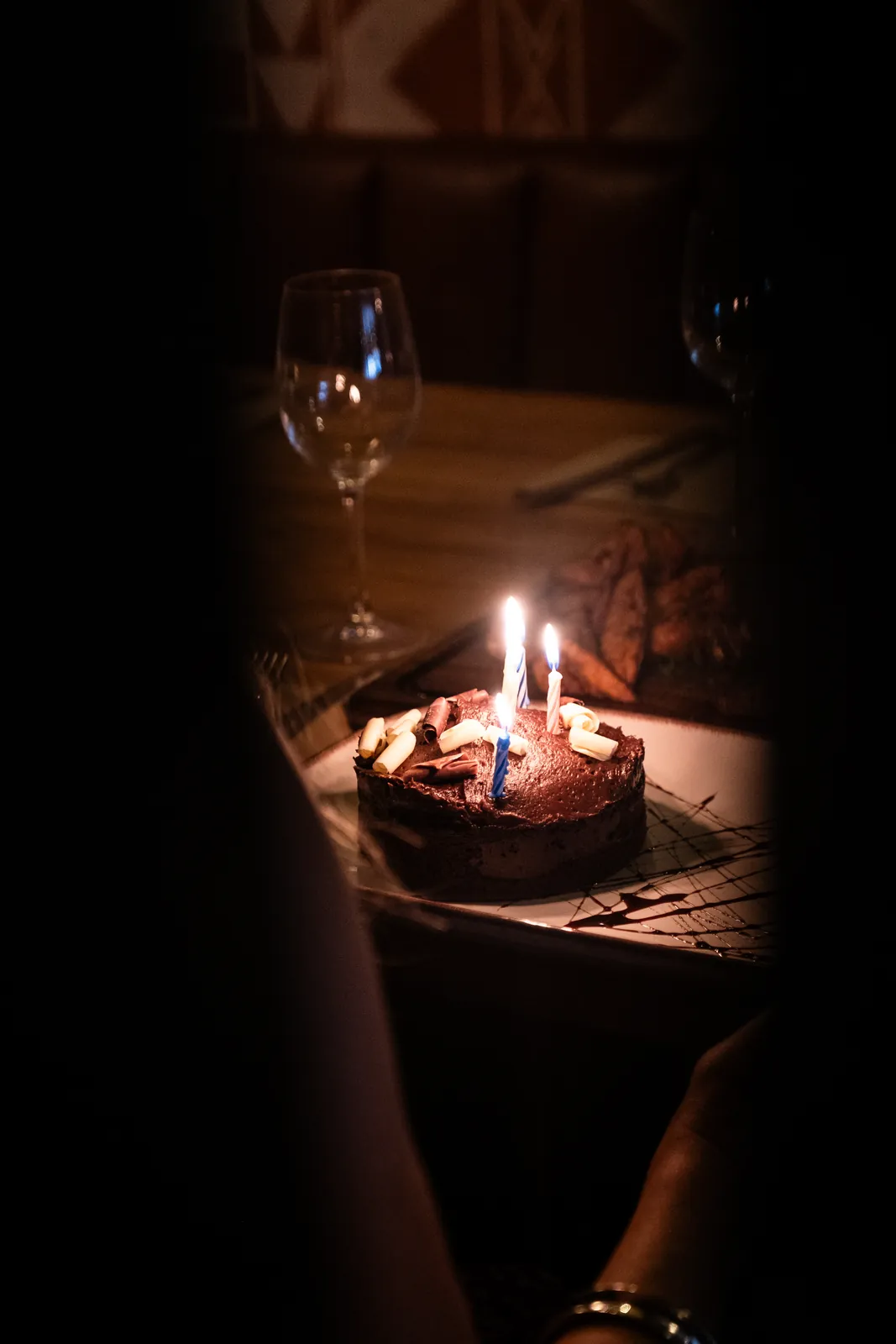 A candlelit dessert at the table