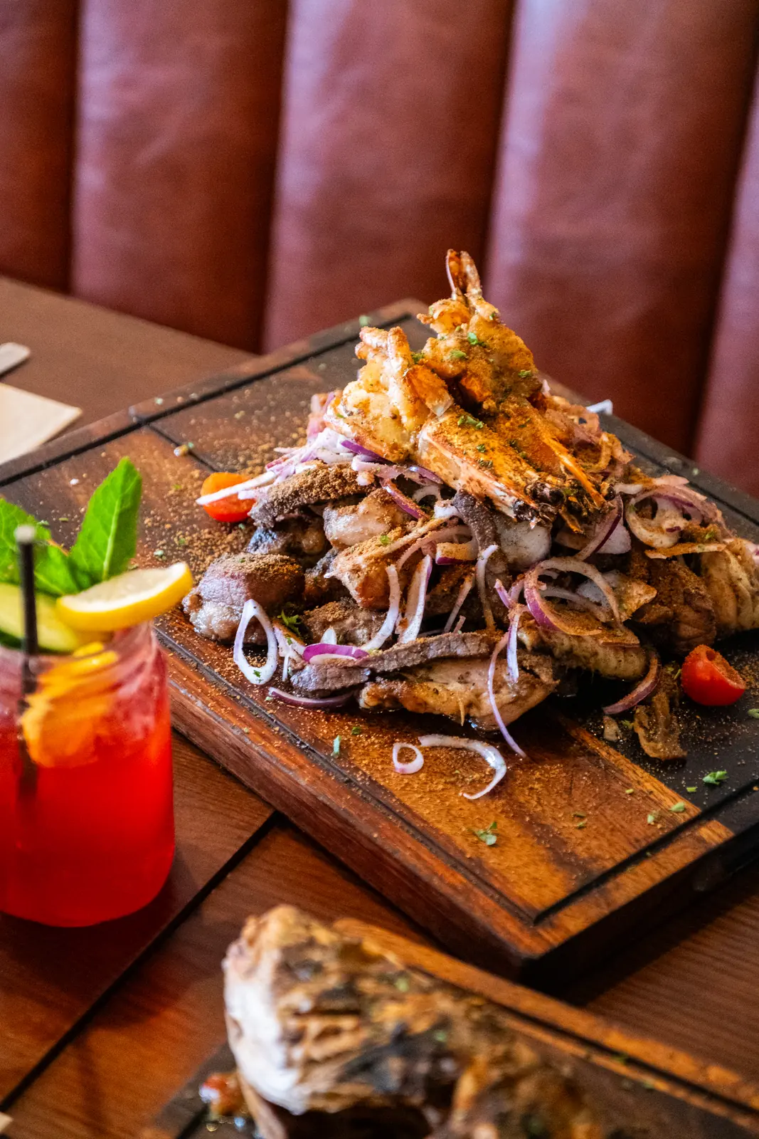 A sharing feast with colourful cocktails